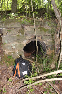 Culvert with backpack for scale. James Lowery, July 12, 2015