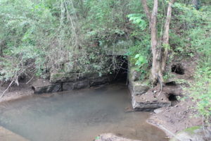 Tributary of Self Creek flows through culvert. (NOTE wing-walls for handling large amount of water flowing through culvert.) James Lowery, May 18, 2016